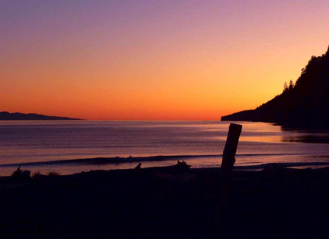 We stayed overnight in our motorhome at the Pacheedaht campsite. It's in Port Renfrew on Vancouver Island, Canada. It was quiet and we watched many beautiful sunsets views.