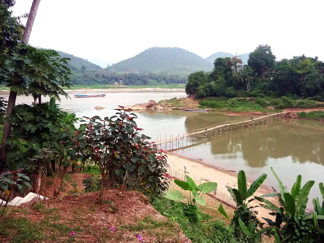 The long bamboo bridge spanning the Nam Khan River is repaired yearly during the dry season.