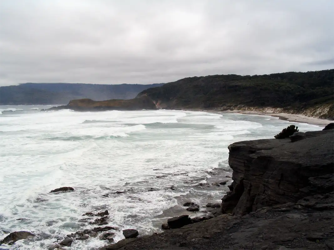 From Cockle Creek, we did the South Cape Bay Track, which is a 4–5 hour (15.4 km) hike that starts at the end of Australia's most southerly road and is part of the South Coast Track to Port Davey. View of the wild Southern Ocean and Lion Rock.