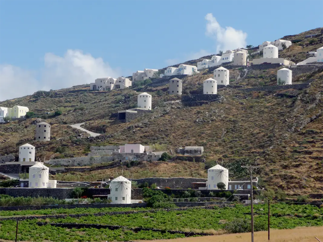 In Santorini's countryside, many windmills once milled wheat. These old buildings have become bed and breakfasts, restaurants, and wedding sites.