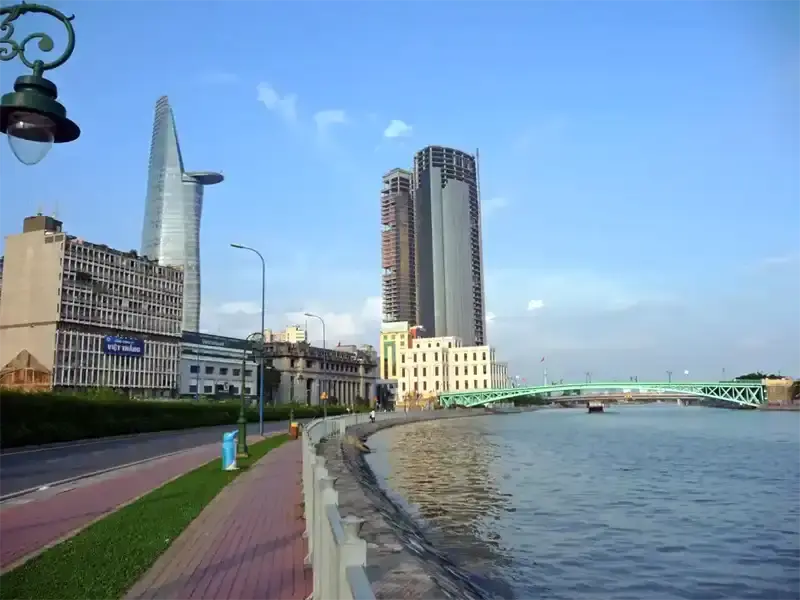 Ho Chi Minh City skyline with modern skyscrapers and riverfront, Vietnam.