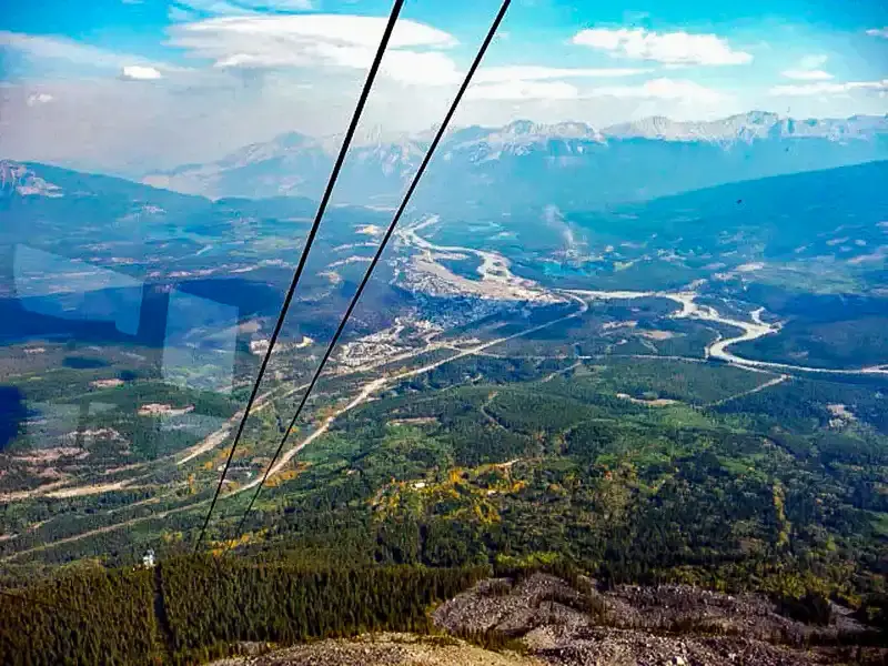 Jasper SkyTram ascending Whistlers Mountain in Jasper National Park with panoramic views over the green valleys of the Canadian Rockies.