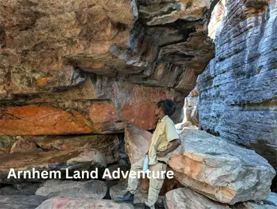 Aboriginal guide sharing the stories and cultural meaning of ancient rock art in Arnhem Land.