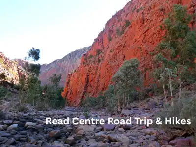 View of glowing red cliffs from the Ormiston Pound Loop, West MacDonnell Ranges, Northern Territory.