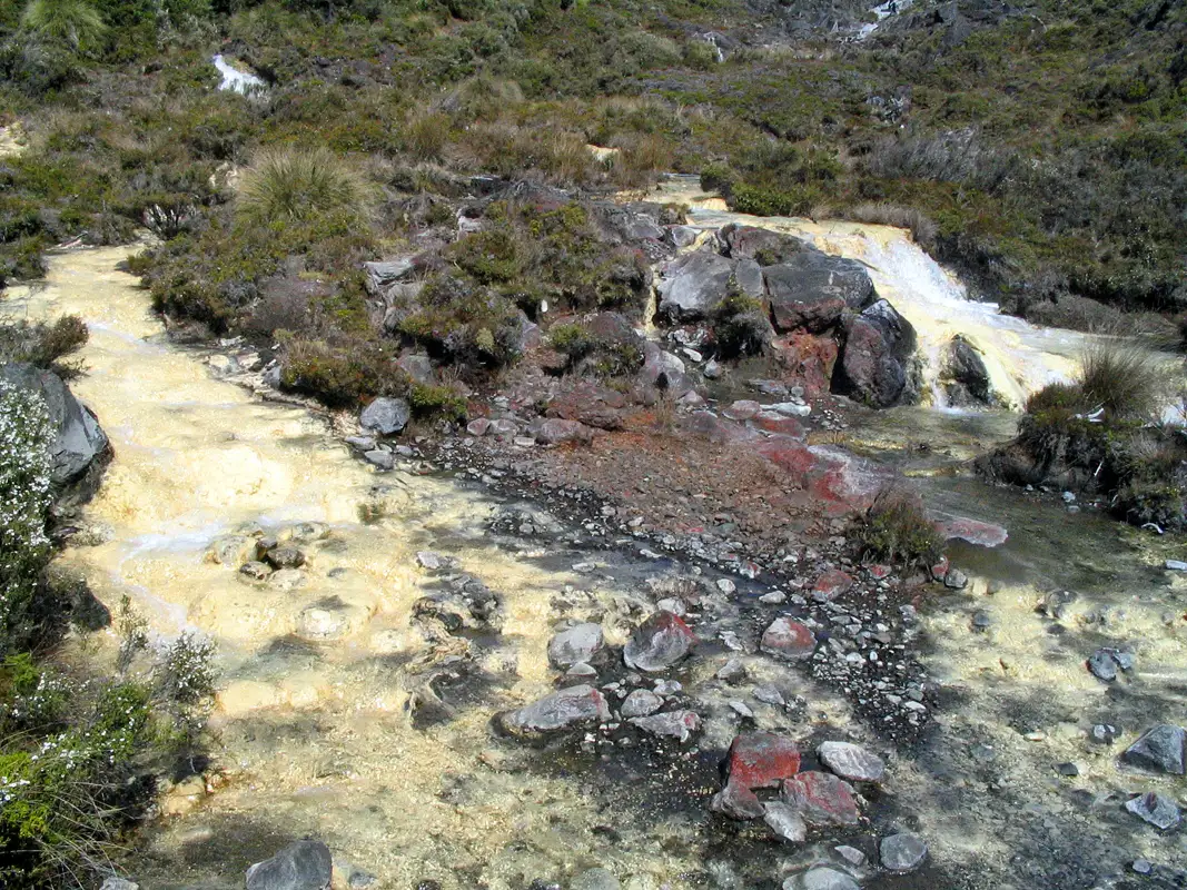 Silica Rapids Track view of creamy white deposits. New Zealand