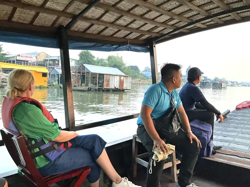 Crossing the Mekong in a small boat Vietnam 1