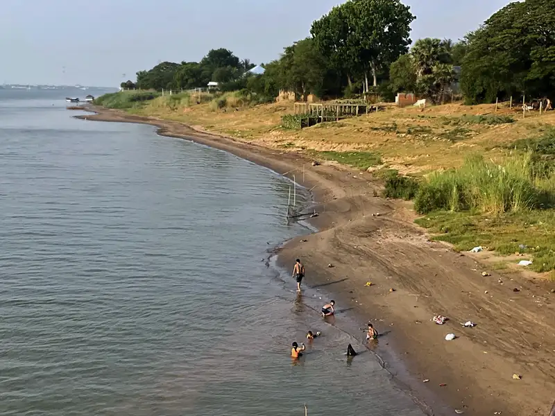 people bathing in the Mekong River