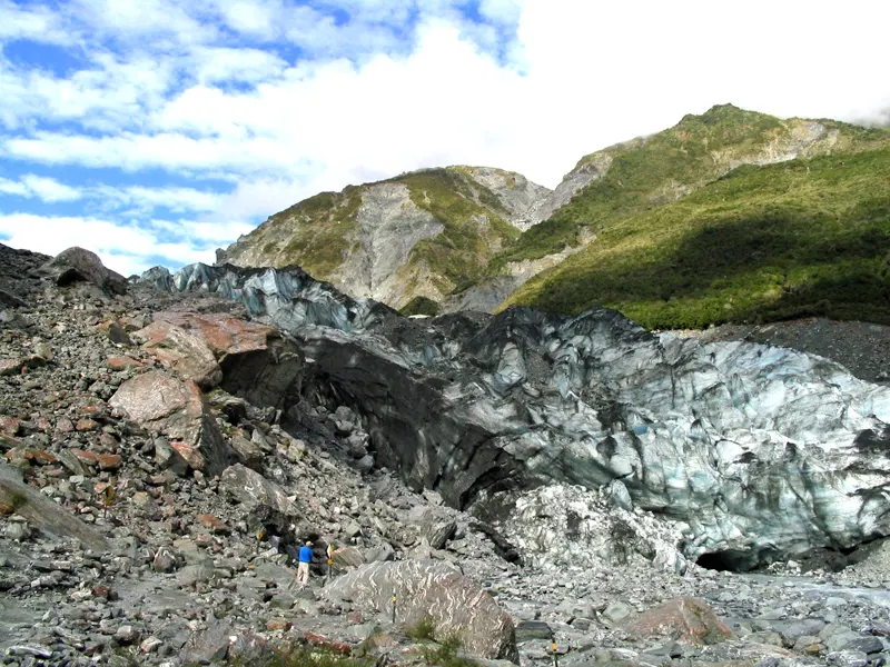 Standing at terminal face of the Franz Josef Glacier South Island NZ