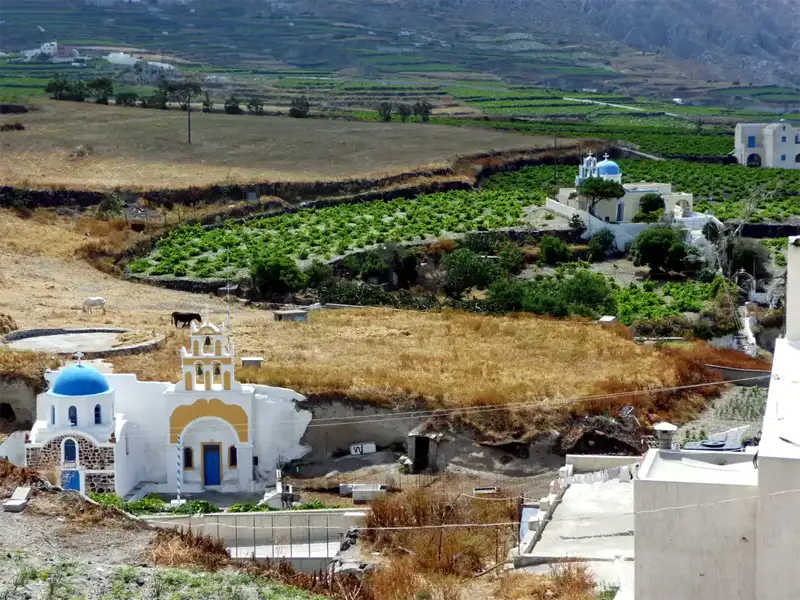 Santorini church with blue roof greece