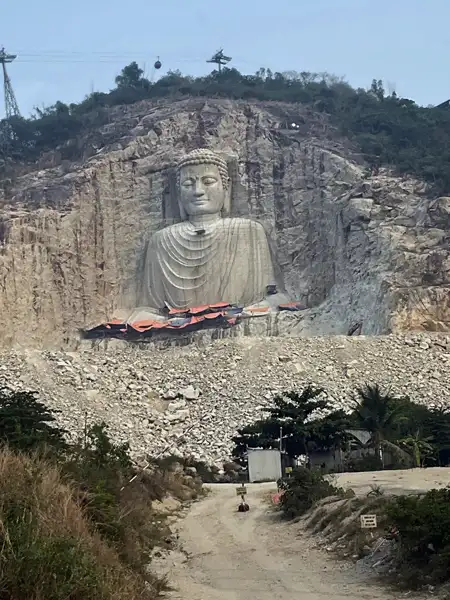 the Shakyamuni Buddha statue, an impressive 81-metre-high image carved directly into the mountainsid